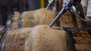 Filling barrels with Old Rasputin Russian Imperial Stout