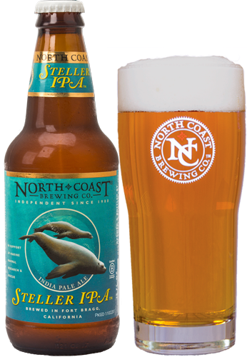 A bottle of North Coast Steller IPA and a pour of it into a pint glass.