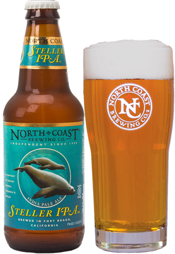 A bottle of North Coast Steller IPA and a pour of it into a pint glass.