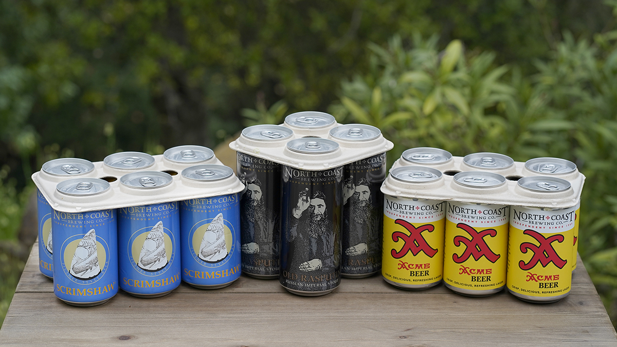 Six- and four-packs of Scrimshaw, Old Rasputin, and Acme Beer, packaged with sustainable can rings.