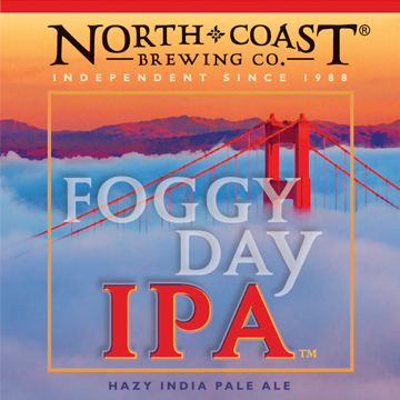 Label for Foggy Day IPA features a single span of the Golden Gate Bridge rising above the fog with sunset and mountains in the background. Hazy India Pale Ale