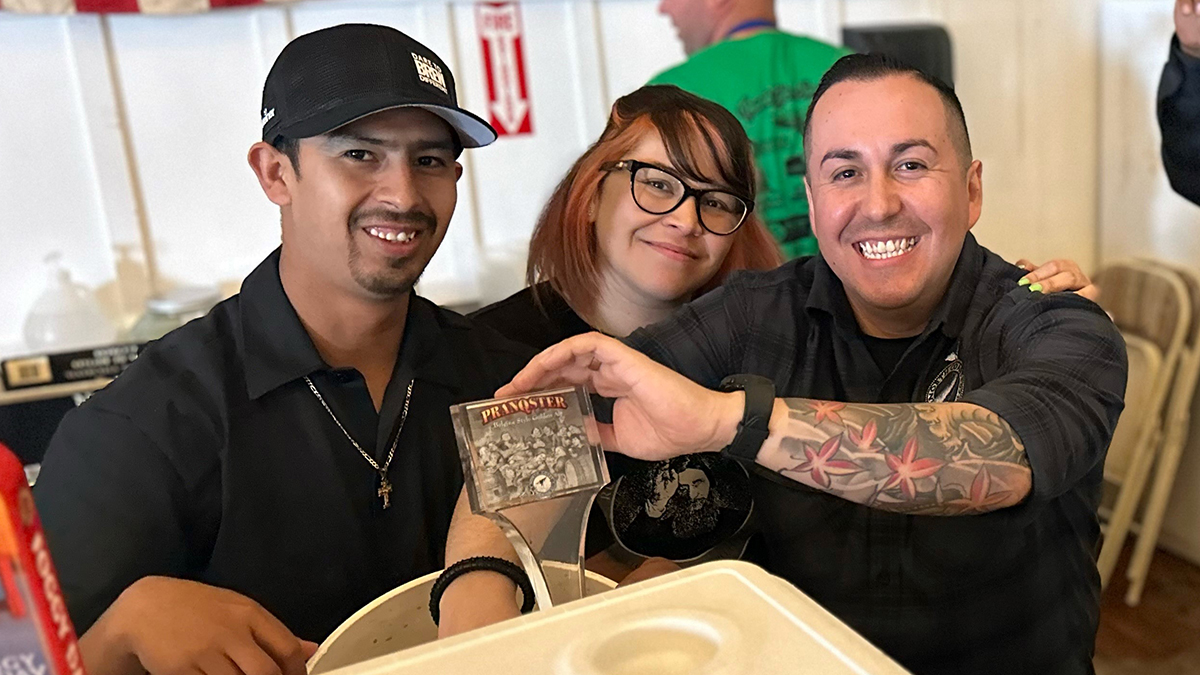  Three NCBC employees pouring beer at Fort Bragg Whale Festival.